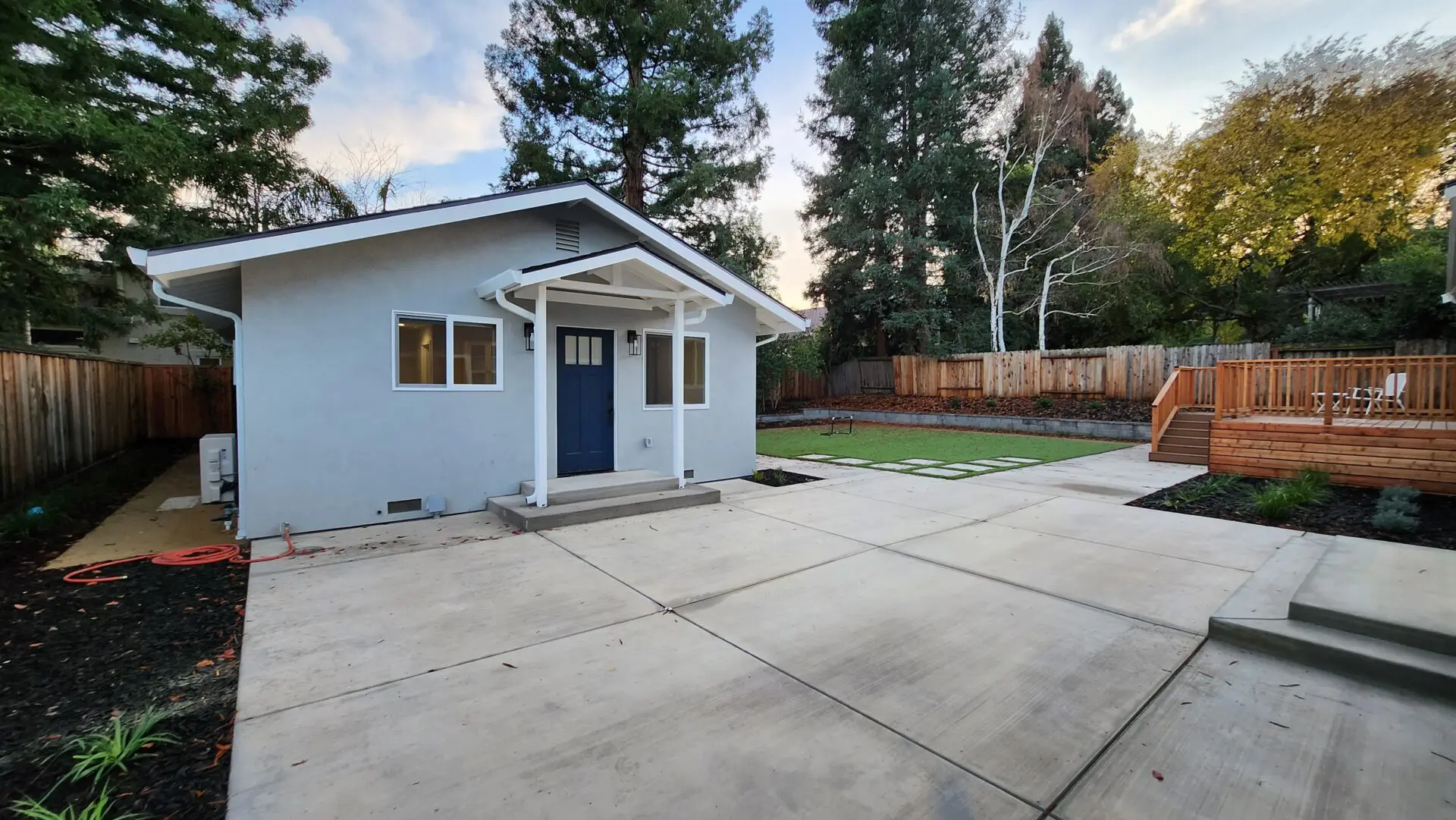 A house with a blue door and white trim.